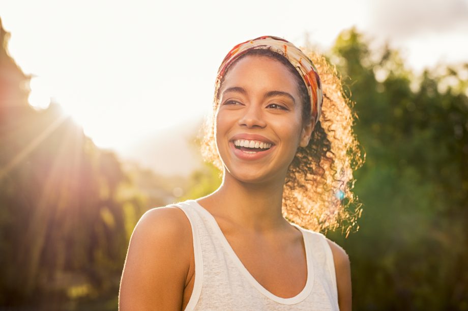 Young Woman Smiling in the Sunshine