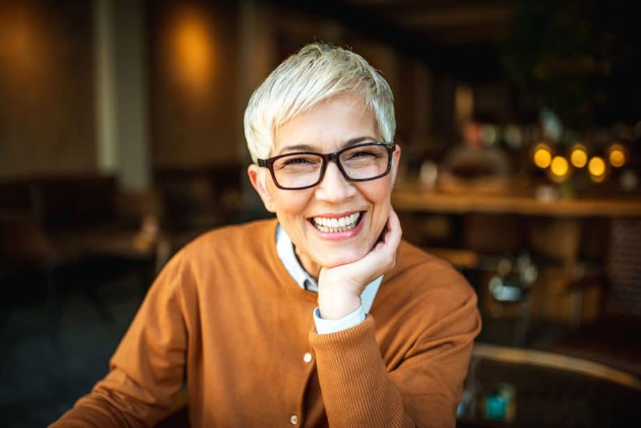 woman smiling with dental implants